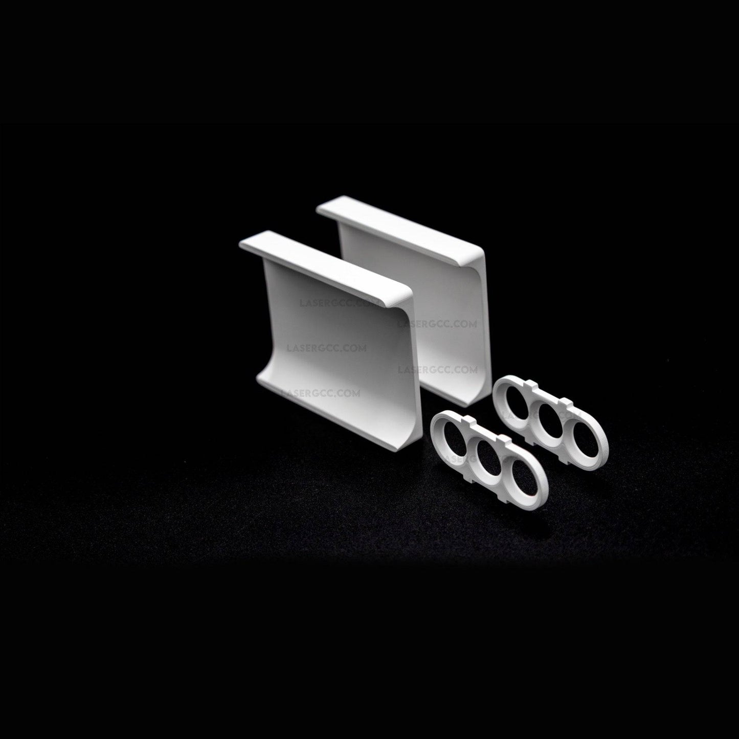 Side view of Cynosure Elite Plus Cavity Ceramic Reflector set showcasing precision-crafted ceramic reflectors and accessory parts, made in the USA.