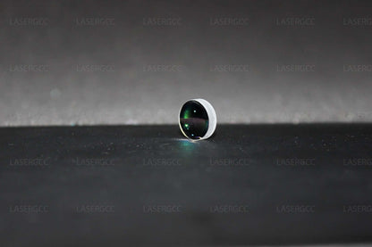 Handpiece lenses for laser devices